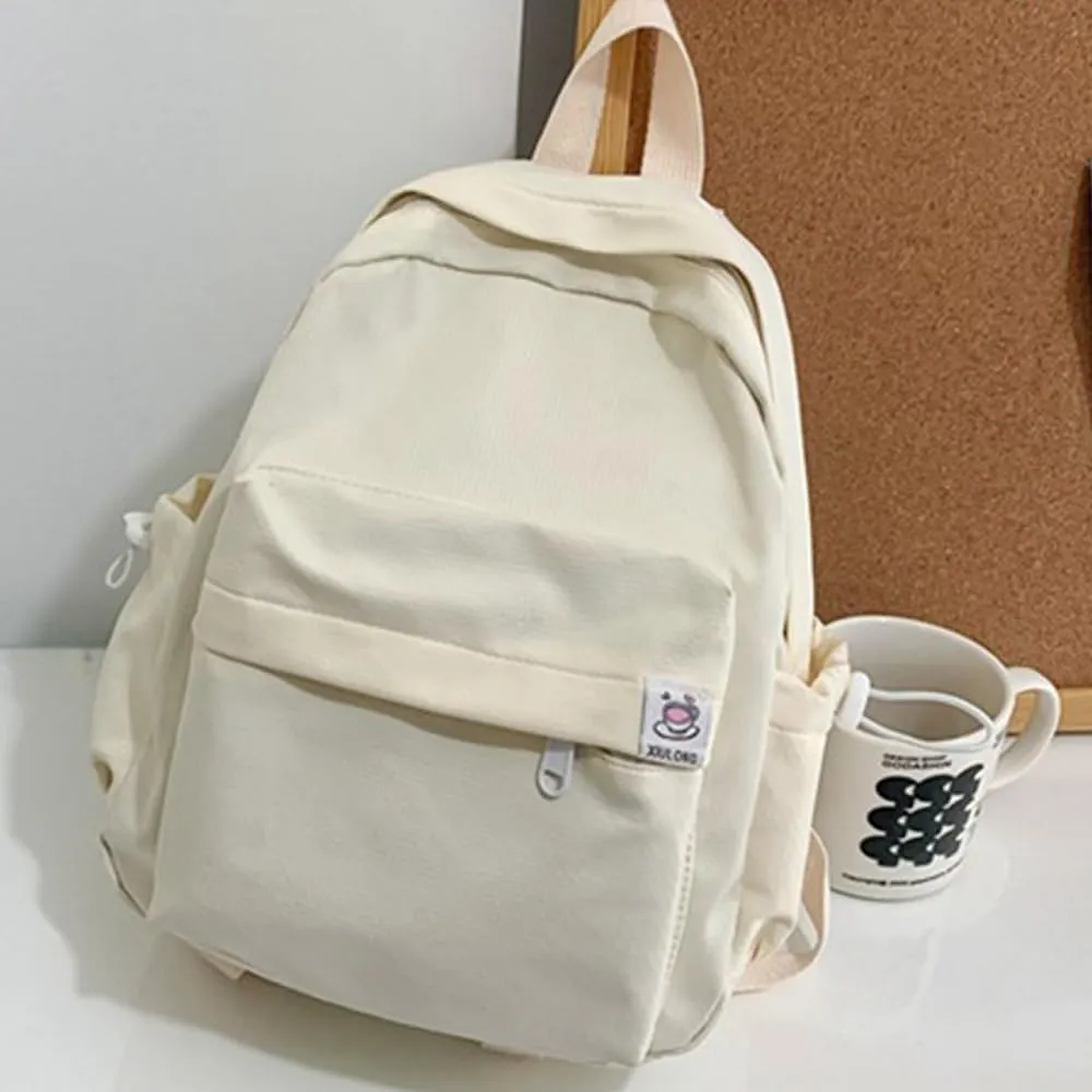 ALTALIVA Aesthetic Backpack Mini Canvas Korean Backpack with Kawaii Accessories, Laptop Lightweight Travel Backpack for Women (White)