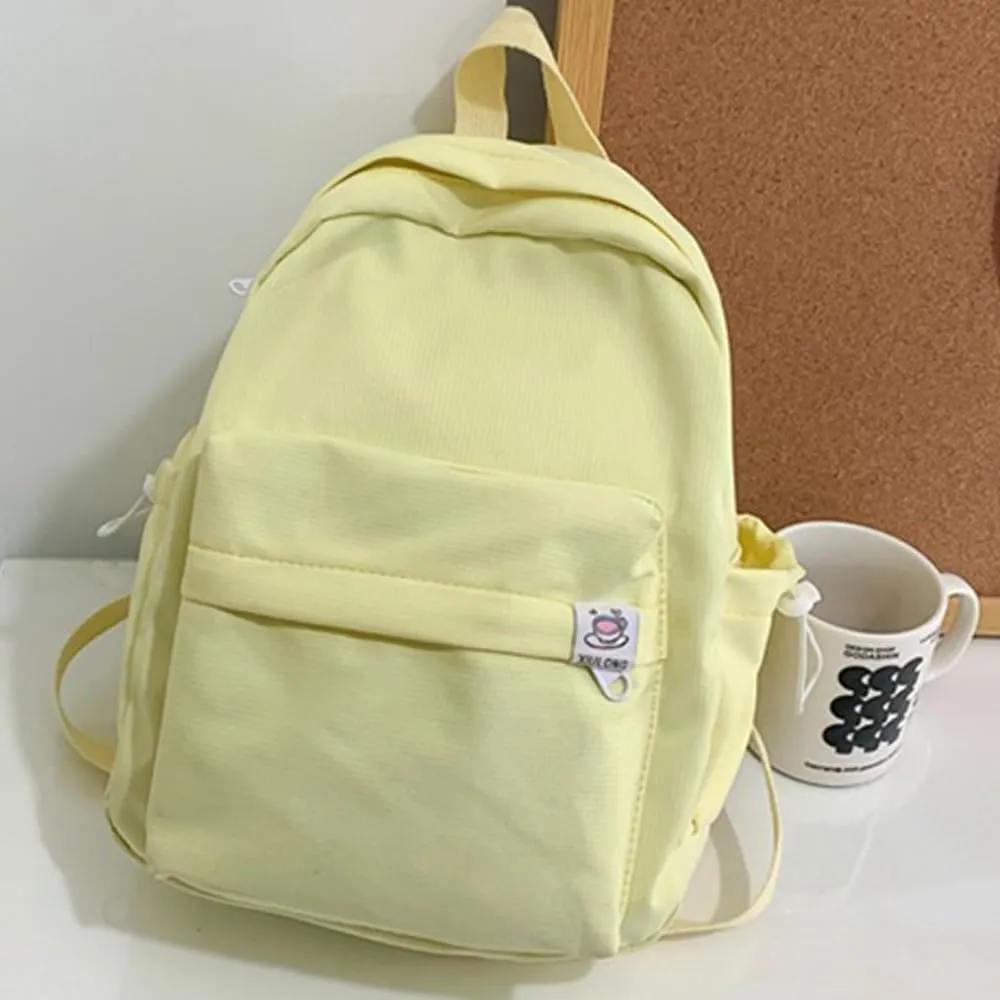 ALTALIVA Aesthetic Backpack Mini Canvas Korean Backpack with Kawaii Accessories, Laptop Lightweight Travel Backpack for Women (Yellow)